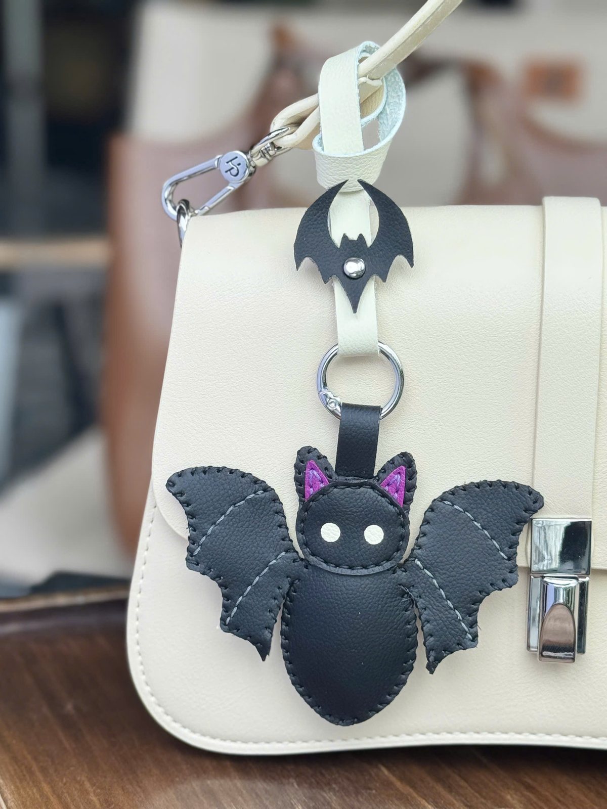 Bat leather charm detail