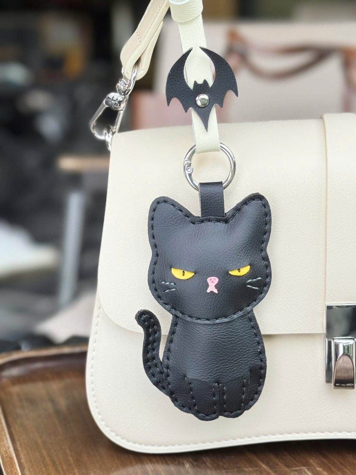 Black Cat leather charm detail
