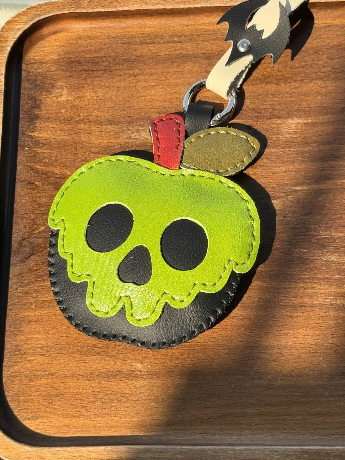 Poison Apple leather charm