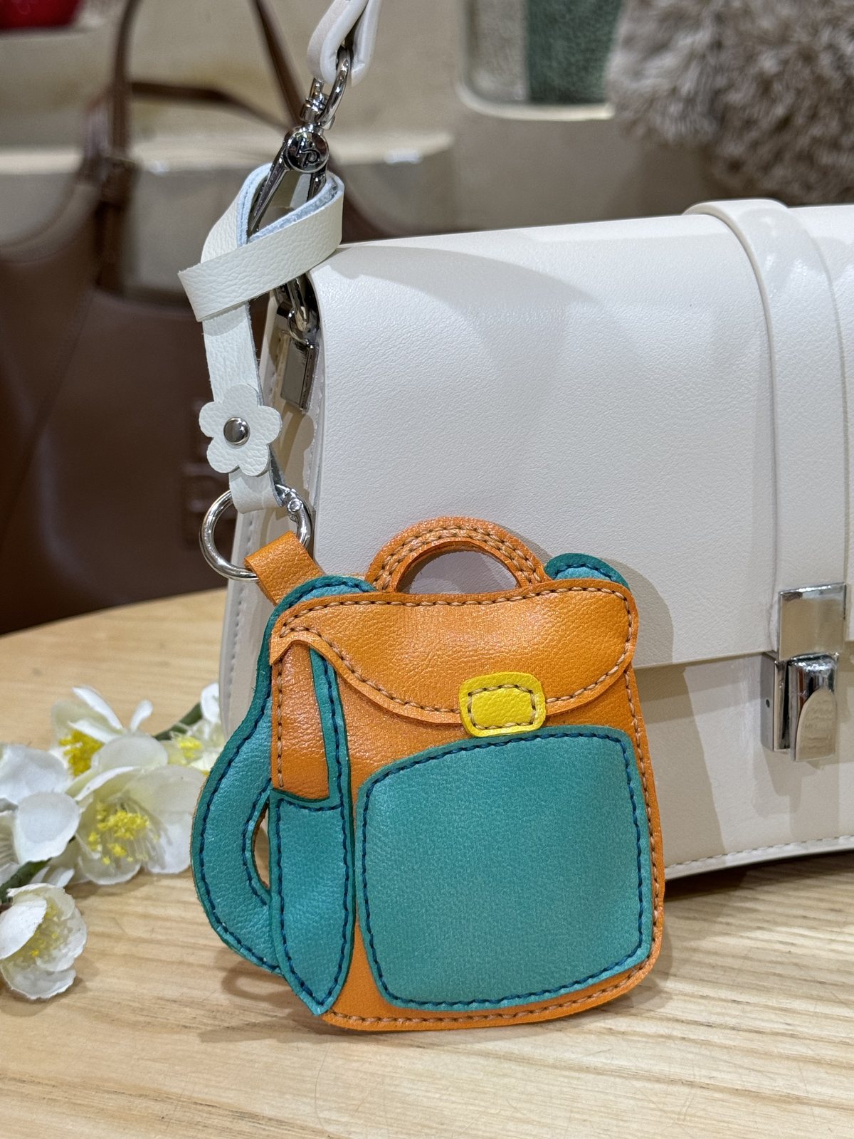 Backpack leather charm on bag