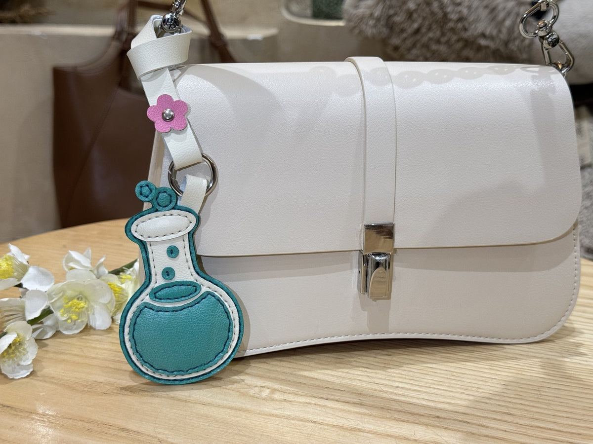 Chemistry Flask leather charm on bag