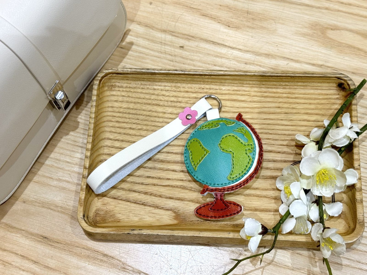 Globe leather charm